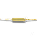 18k yellow gold ID bracelet with boy motif charm and gem