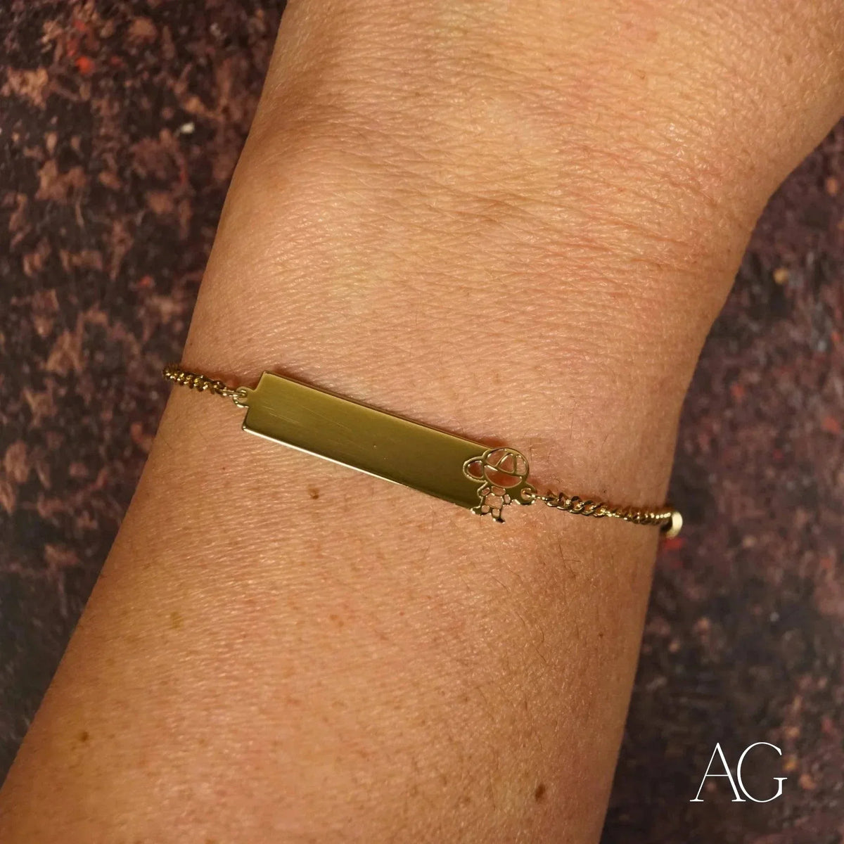 18k yellow gold boys ID bracelet with rectangular plate and charm
