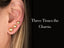 18K gold ball stud earrings: woman’s ear with three graduated art gold jewelry