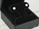 Classic Lustre 18k gold pearl stud earrings in black velvet box