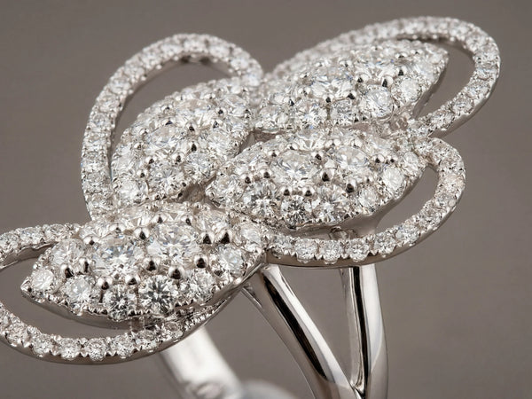 Close-up of 18K white gold diamond statement ring craftsmanship - ArtGold Jewelry