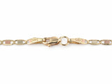 Lobster claw clasp on the 14K gold piastrine chain, both oval end tags stamped 14K