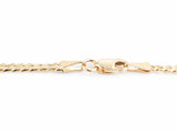 Lobster clasp and end tag on the 14K yellow gold Cuban chain