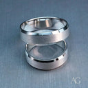 Two polished and brushed 18k white gold wedding bands from Art Gold Jewelry