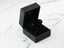 Open black jewelry box with pink gemstone stud earrings from Crimson Radiance art gold jewelry