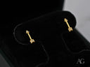 Cupid’s Arrow 18k art gold jewelry stud earrings with pavé CZ diamonds and push-back clasp
