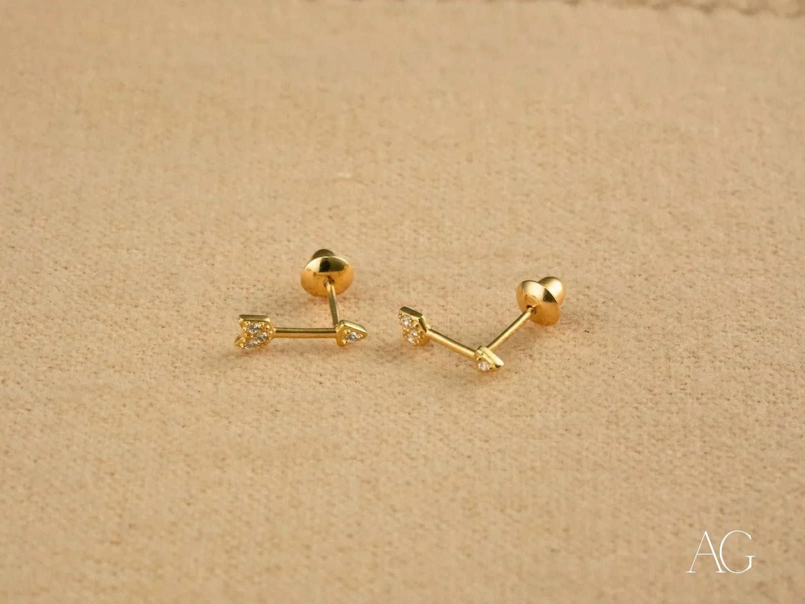 Cupid’s Arrow 18k Gold CZ arrow stud earrings with push-back clasp