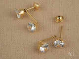 Dazzle Duo 18K gold double CZ earrings with faceted gemstones