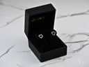 Elegant 18k gold heart earrings with cubic zirconia stones in black box