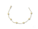 Delicate solid 18k gold bracelet with polished gold spheres