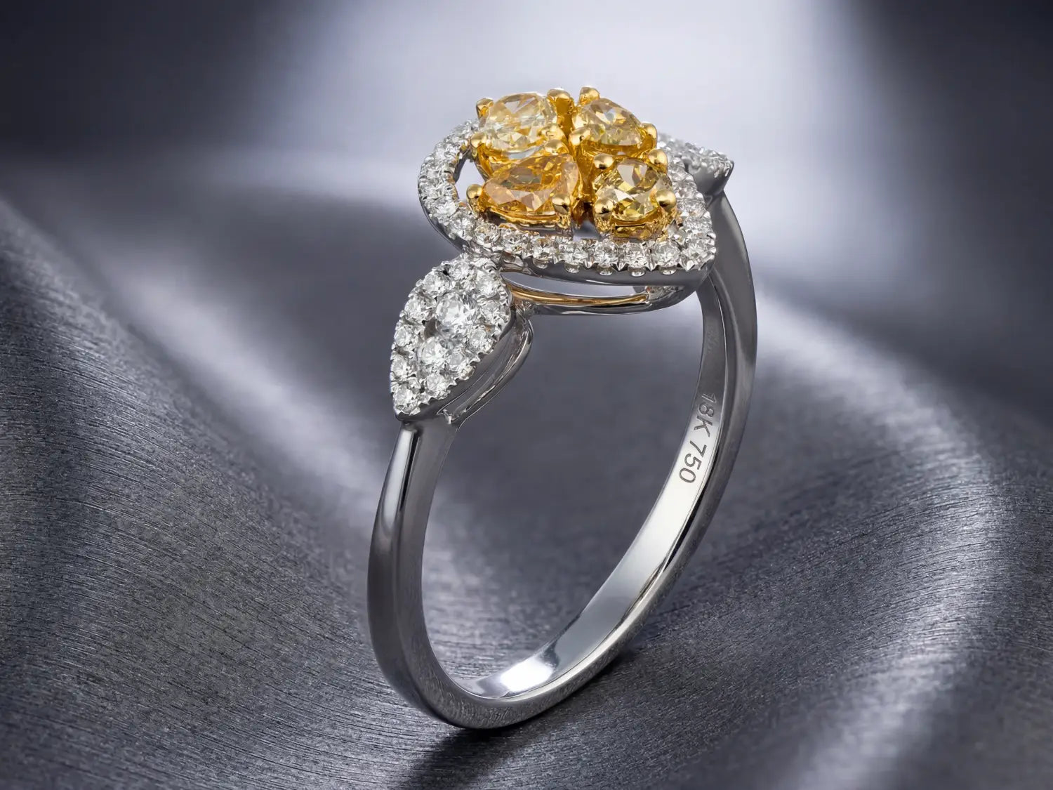 A collection of fine jewelry diamond rings with silver bands featuring various cuts in an ethical heirloom context.