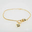 Delicate 18k gold bracelet with heart charm and zirconia bead, ideal art gold jewelry in Greater Boston Area