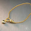 Gold chain necklace with heart charm and diamond bead, ideal art gold jewelry in 18k gold bracelet