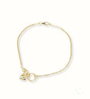 Delicate 18k gold bracelet with teddy bear and E initial charms