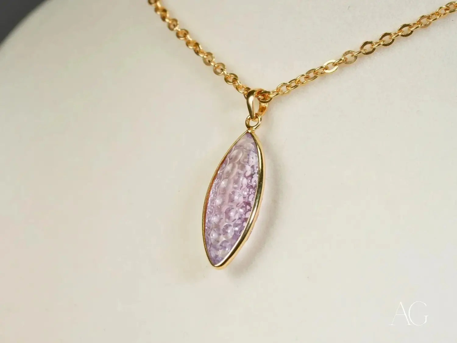 Marquise lavender gem in art gold jewelry pendant, royal jewels style.