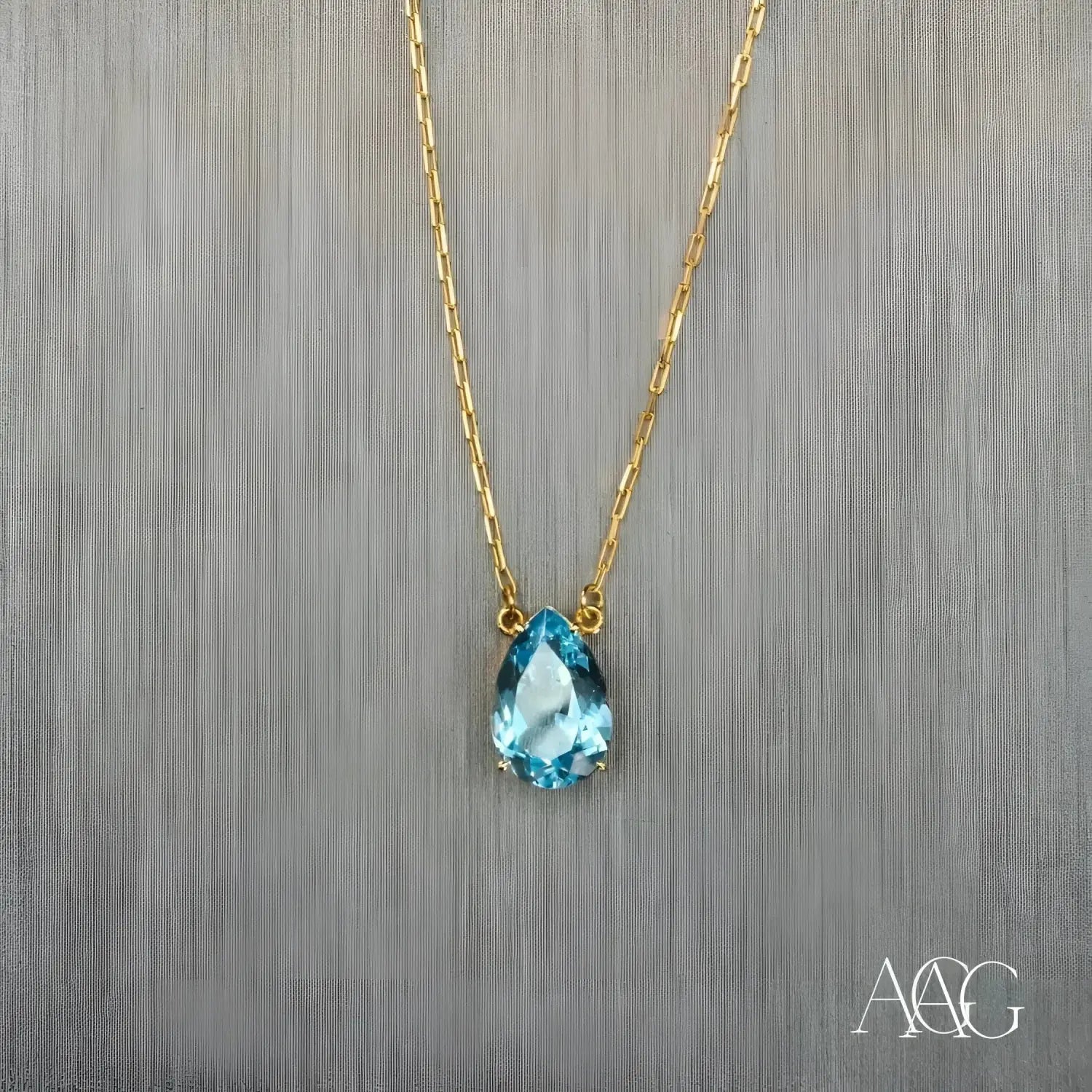 Delicate Roberto Coin blue topaz teardrop necklace from royal jewels