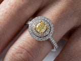 Detailed close-up of double halo engagement ring center stone and surrounding diamonds