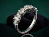 Diamond half-band wedding ring with nine graduated stones, elevated side view
