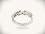 Diamond half-band wedding ring with nine graduated stones, gallery underside view