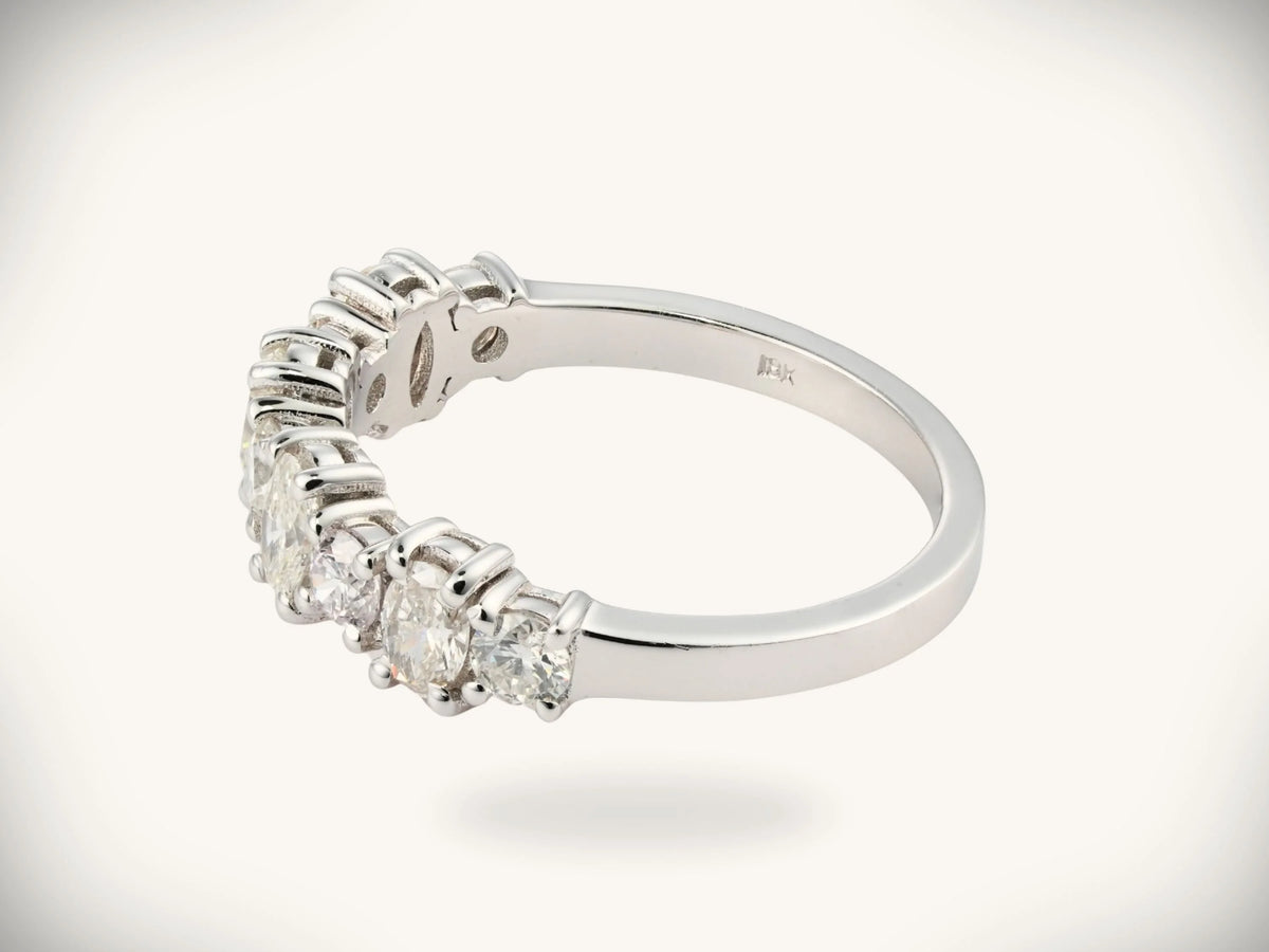Diamond half-band wedding ring with nine graduated stones, interior angle view