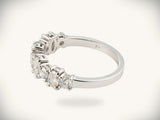 Diamond half-band wedding ring with nine graduated stones, interior angle view