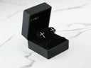 Pair of 18k gold cross CZ stud earrings in black velvet box
