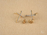18k gold cross stud earrings with CZ gems in Divine Sparkle design