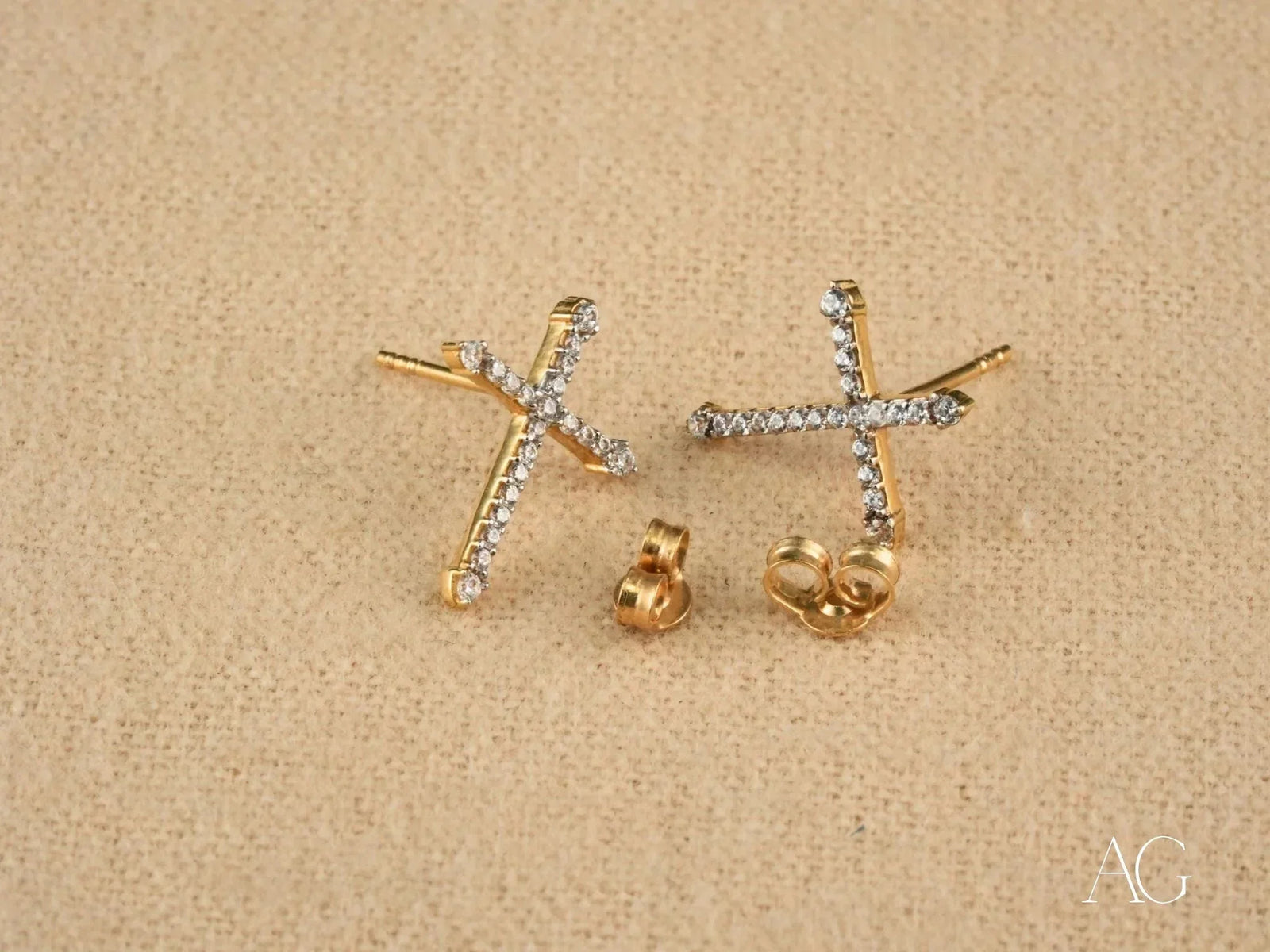 18k gold cross stud earrings with CZ gems in Divine Sparkle design