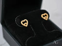 Double Love gold CZ heart earrings with diamond pavé and infinity cutout