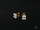 18K gold-backed double pearl stud earrings in art gold jewelry style
