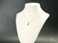 Gold necklace with a small stylized boy pendant, part of Dual Elegance Pendant art gold jewelry in 18k solid gold