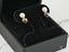 Eclipse Elegance earrings with 18K gold black and white pearl earrings featuring pearls