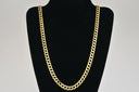 14K solid gold Jefe Chain Cuban link necklace on black display