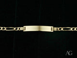 Polished 18k solid gold ID bracelet with Figaro chain