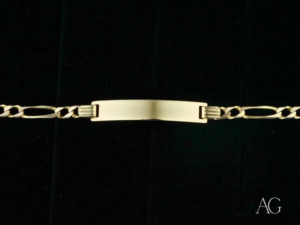 Polished 18k solid gold ID bracelet with Figaro chain