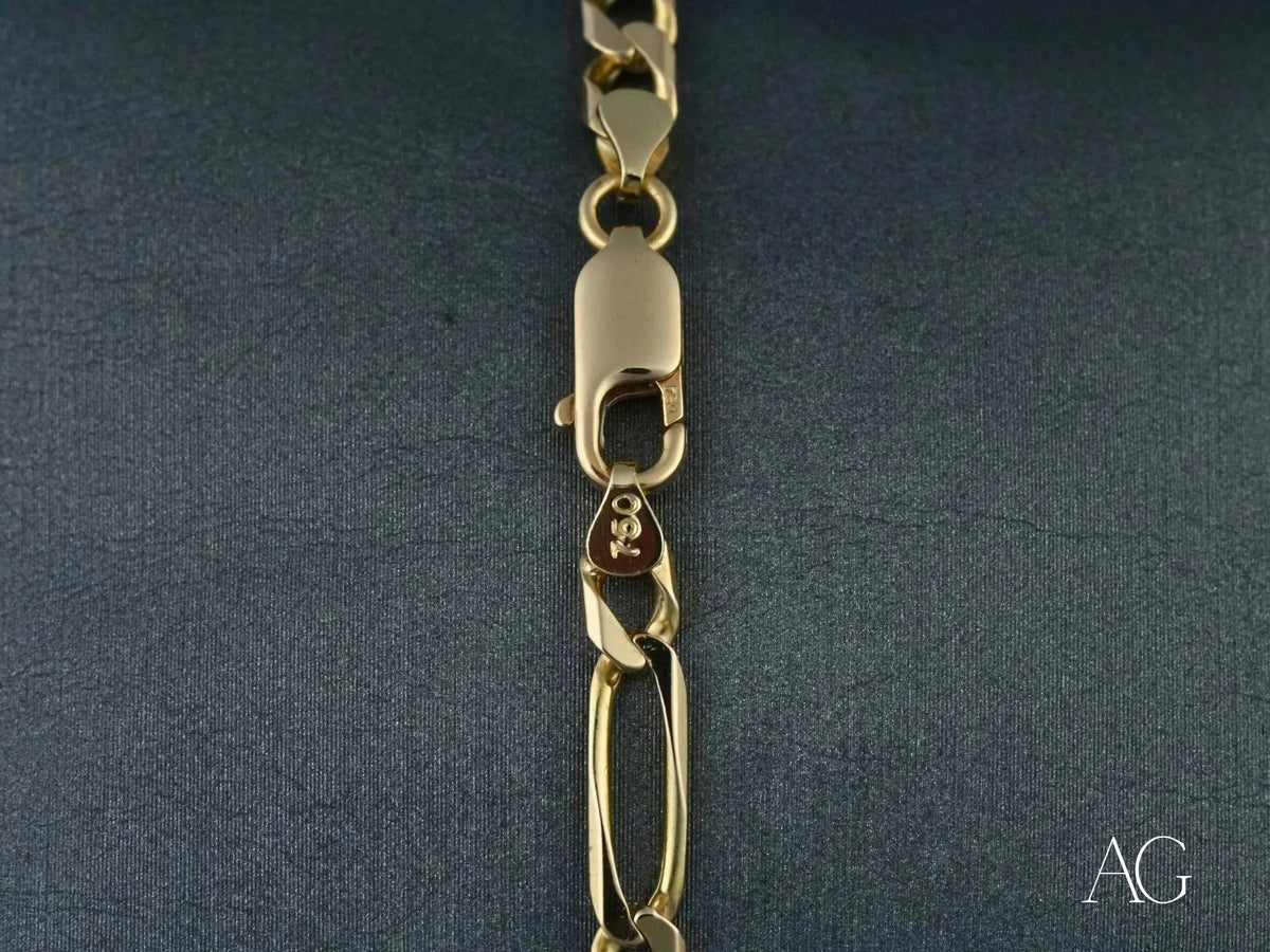 18k solid gold ID bracelet with figaro chain and lobster claw clasp