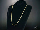 Elegant 14k gold rope chain necklace with secure barrel lock on black display
