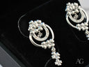 Elegant 18K solid gold floral dangle earrings with sparkling stones