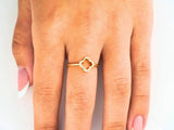 Elegant 18k flower diamond ring with four-leaf clover and diamonds