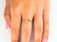 Elegant 18k flower diamond ring featuring a gold four-leaf clover design with small diamonds