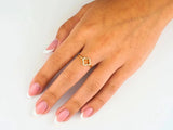 Elegant 18k flower diamond ring with four-leaf clover and white stones