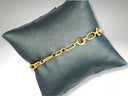 Elegant 18k gold bracelet with oval and elongated links