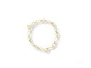 Elegant 18k gold bracelet with oval links and pearl accents