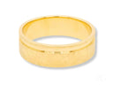 Elegant 18k gold diamond wedding band with textured pattern