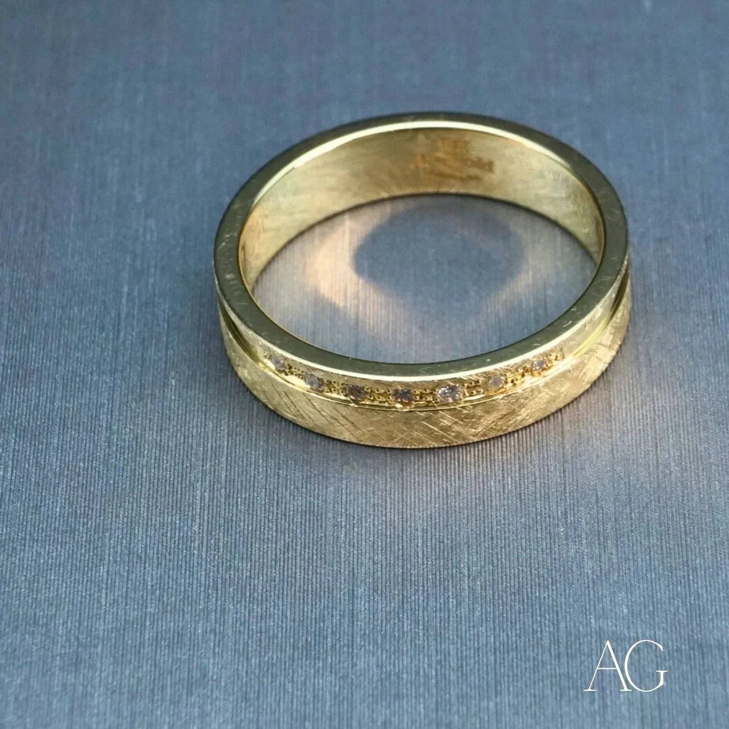 Elegant 18k gold diamond wedding band with channel-set diamonds