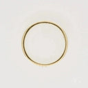 Elegant 18k gold diamond wedding band with thin simple design