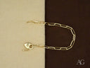 Elegant 18k gold heart-shaped lobster clasp bracelet with key charm