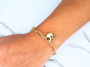 Elegant 18k gold heart-shaped lobster clasp bracelet with padlock key charm