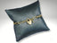 Elegant 18k gold bracelet with heart-shaped lobster clasp, heart padlock, and key