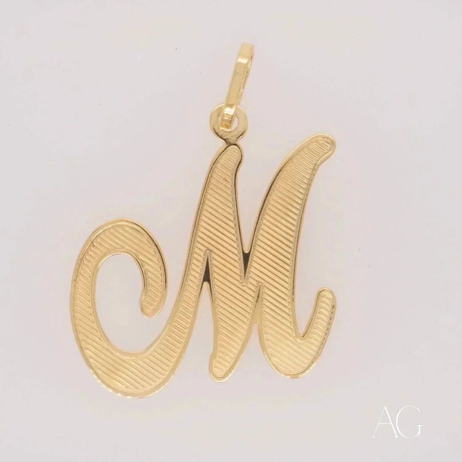 Elegant 18k solid gold letter M pendant with textured finish